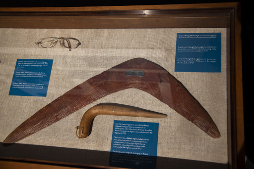 Boomerang, planting stick and glasses