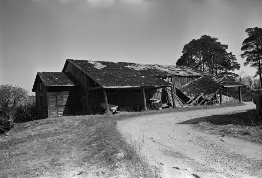The carriage shed and the burned stables